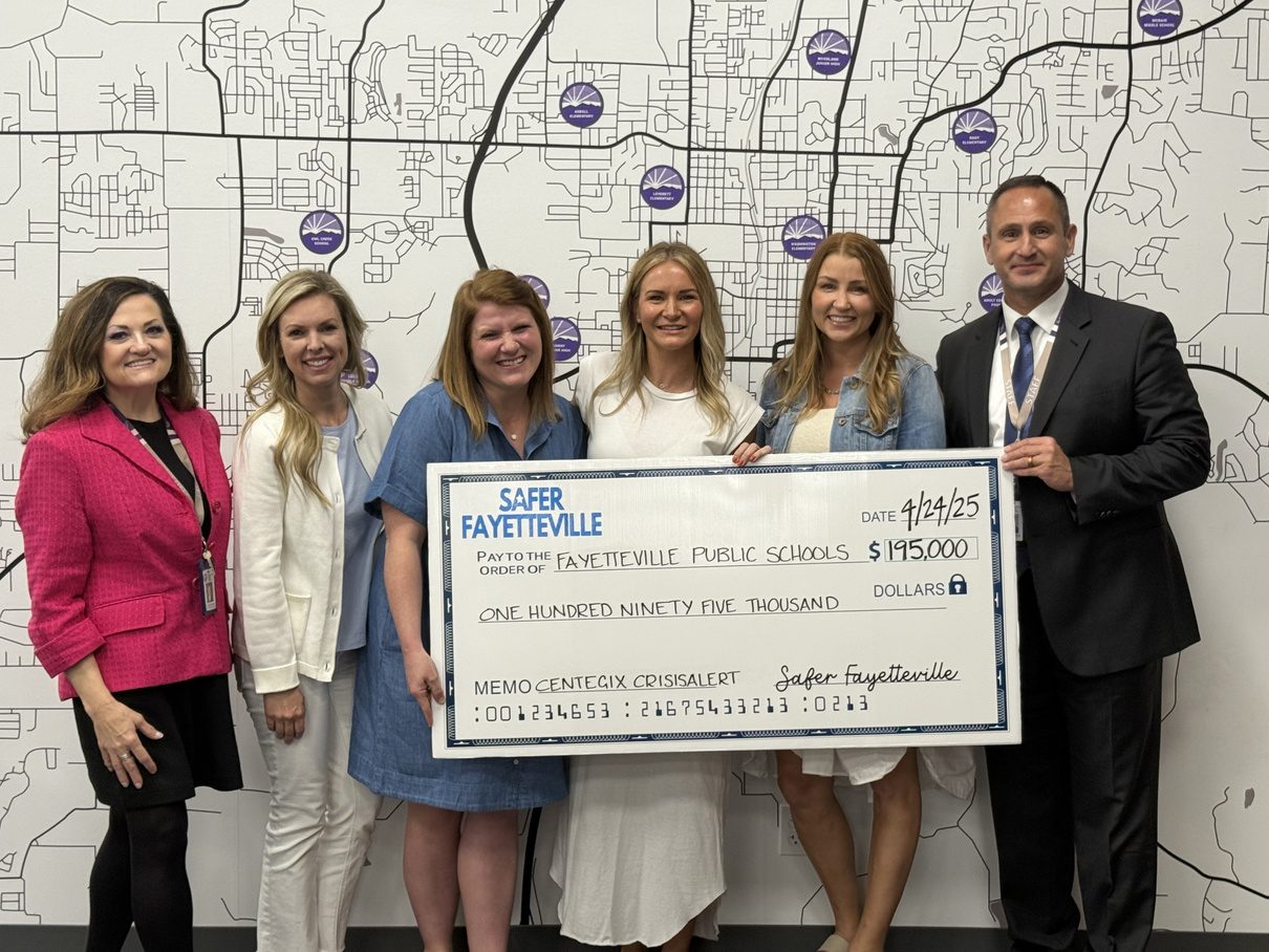Safer Fayetteville presenting a funding check to Fayetteville Public Schools
