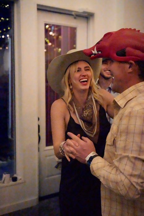 A couple laughing at the event